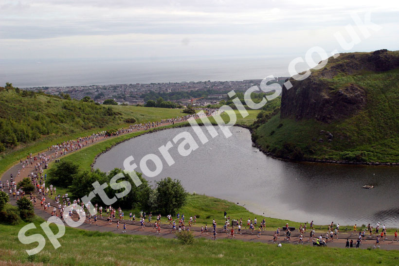 Looking down from Arthur's Seat the Edinburgh Marathon runners pass by June 2003